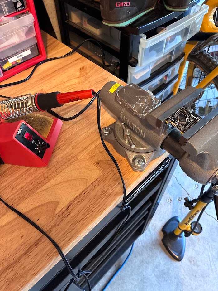 Soldering pins on the microcontroller